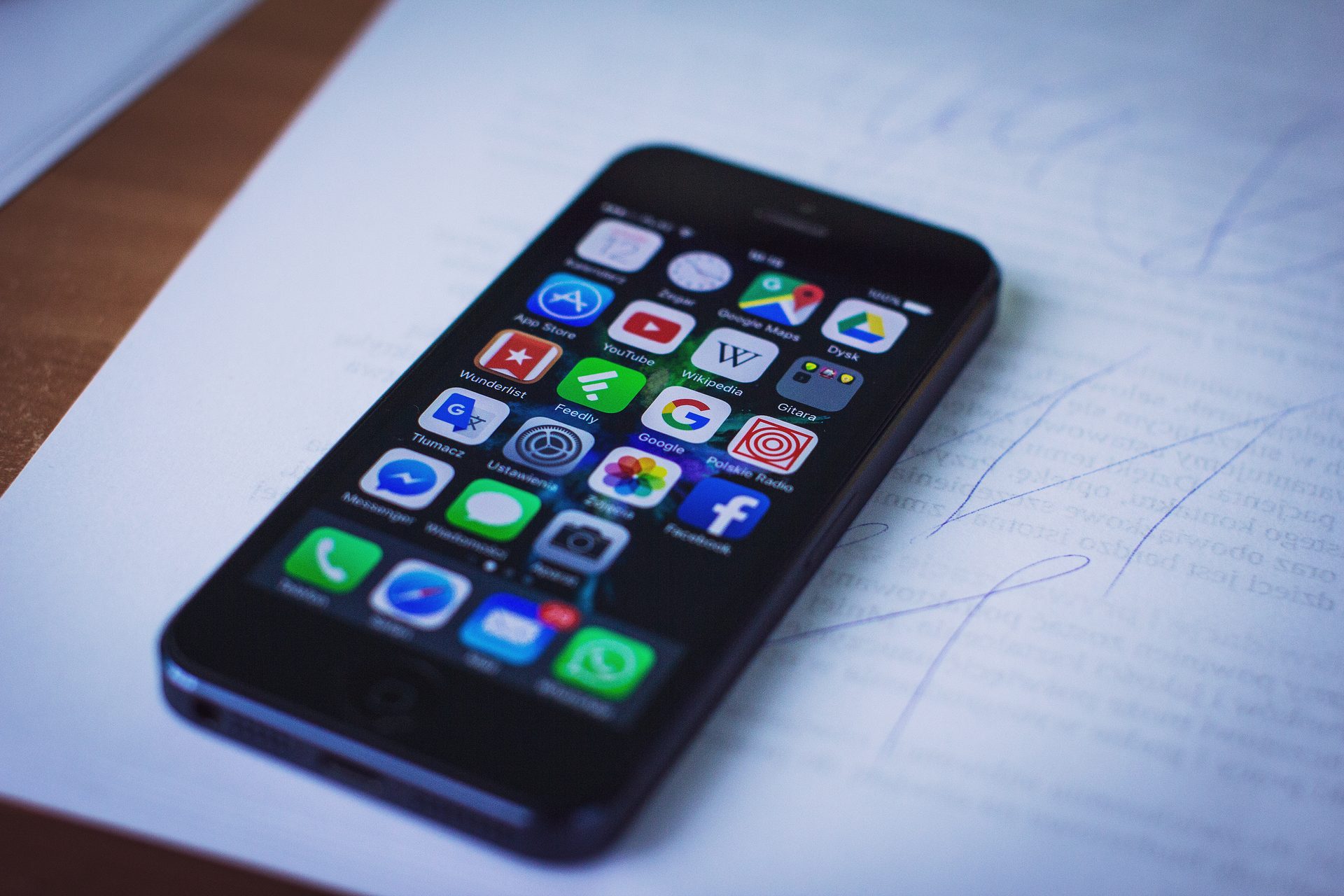 A smartphone home screen showing app icons